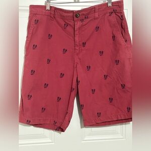 Red Flat Front Shorts with Embroidered Pattern
